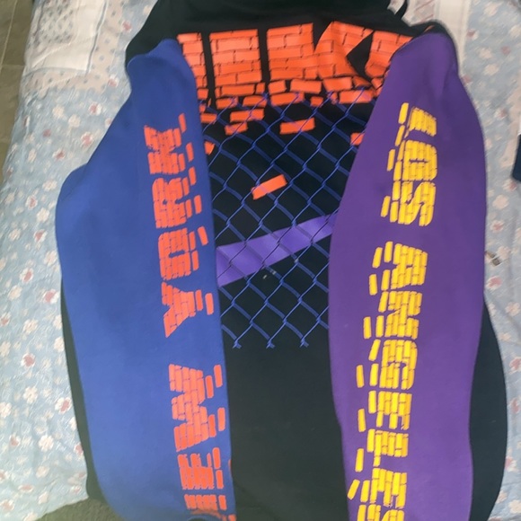 A zip up jacket purple,yellow,orange,blue, and black - Picture 3 of 5